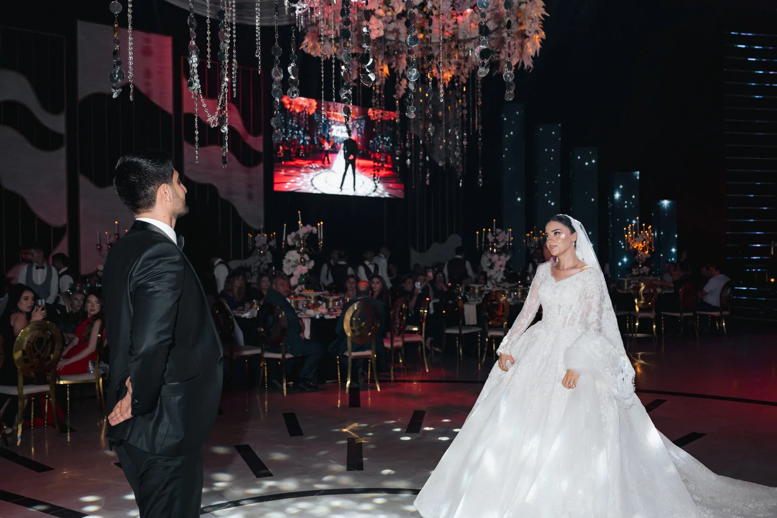 Allahverdi faces Kimya on the dance floor at their wedding in Baku